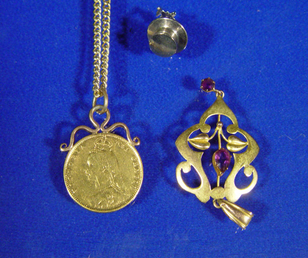 Appraisal: Victorian gold coin pendant a diamond stud and an amethyst