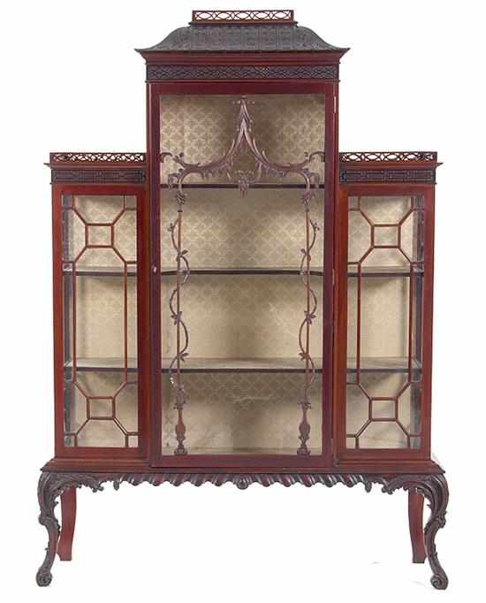 Appraisal: Chinese Chippendale mahogany display cabinet mid th century raised center