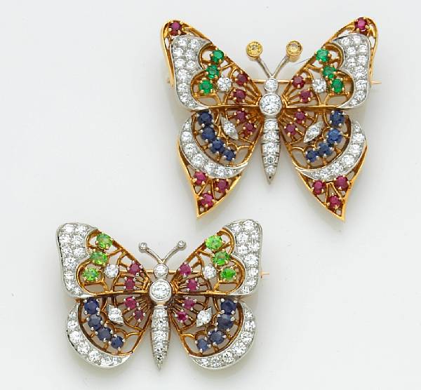 Appraisal: A pair of gem-set diamond and colored diamond butterfly brooches