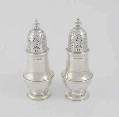 Appraisal: A pair of modern vase-shaped sugar casters the high domed