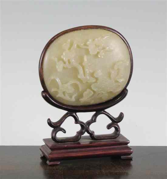 Appraisal: A Chinese oval quartz plaque carved in high relief with