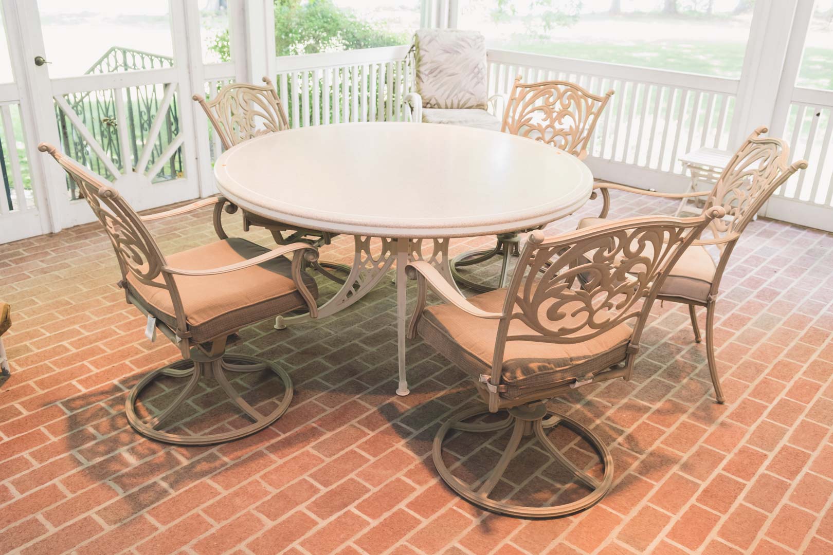 Appraisal: Aluminum patio set including circular laminated granite top table four