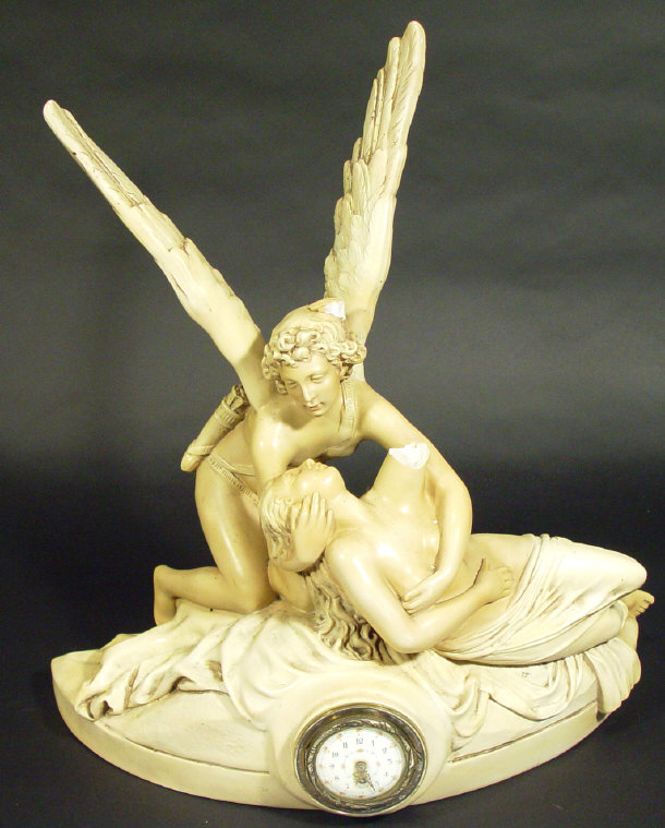 Appraisal: Plaster mantel clock modelled with a cherub and nude female