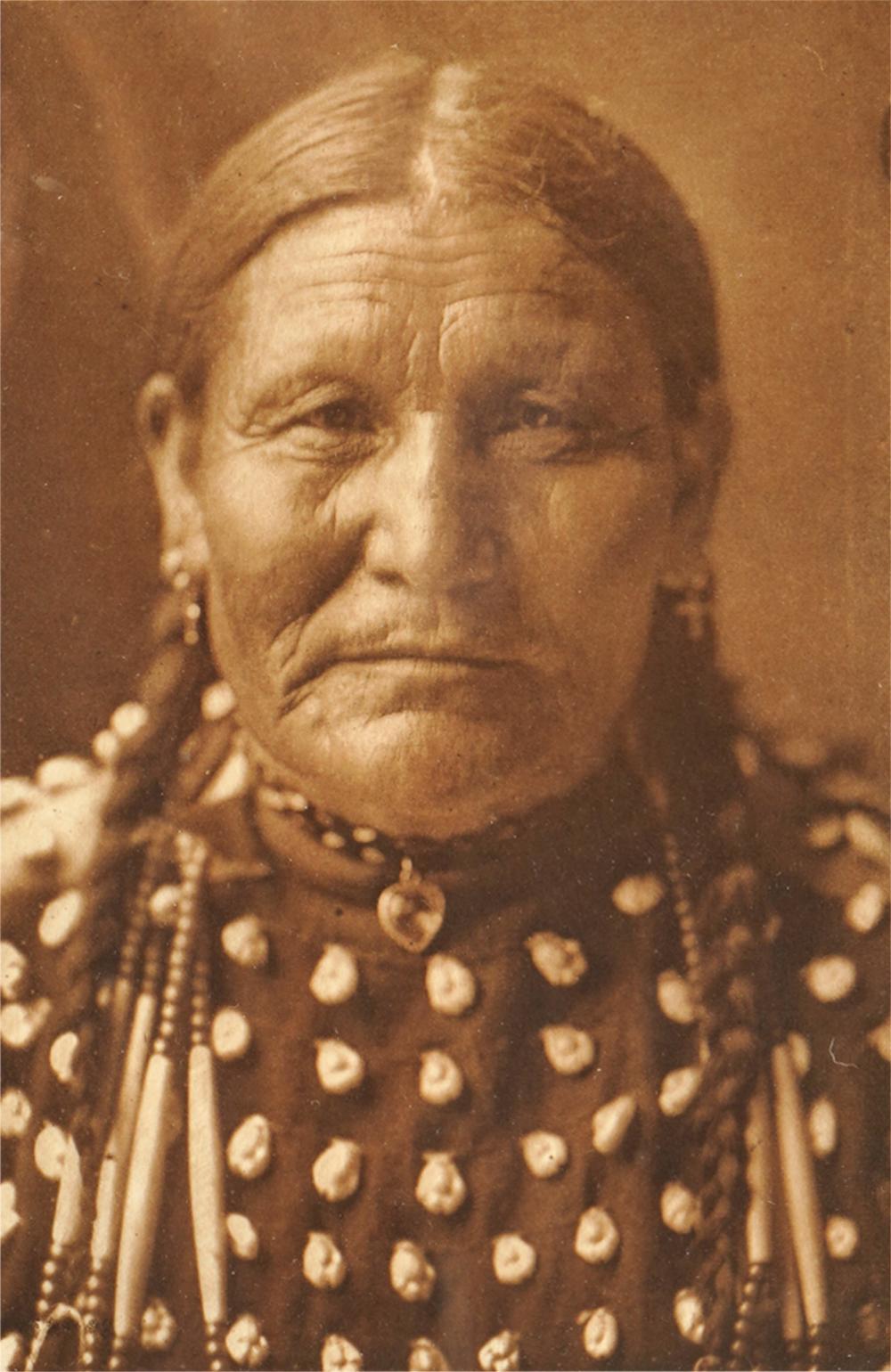 Appraisal: AFTER EDWARD CURTIS GOOD DAY WOMAN - OGALALA photographic print