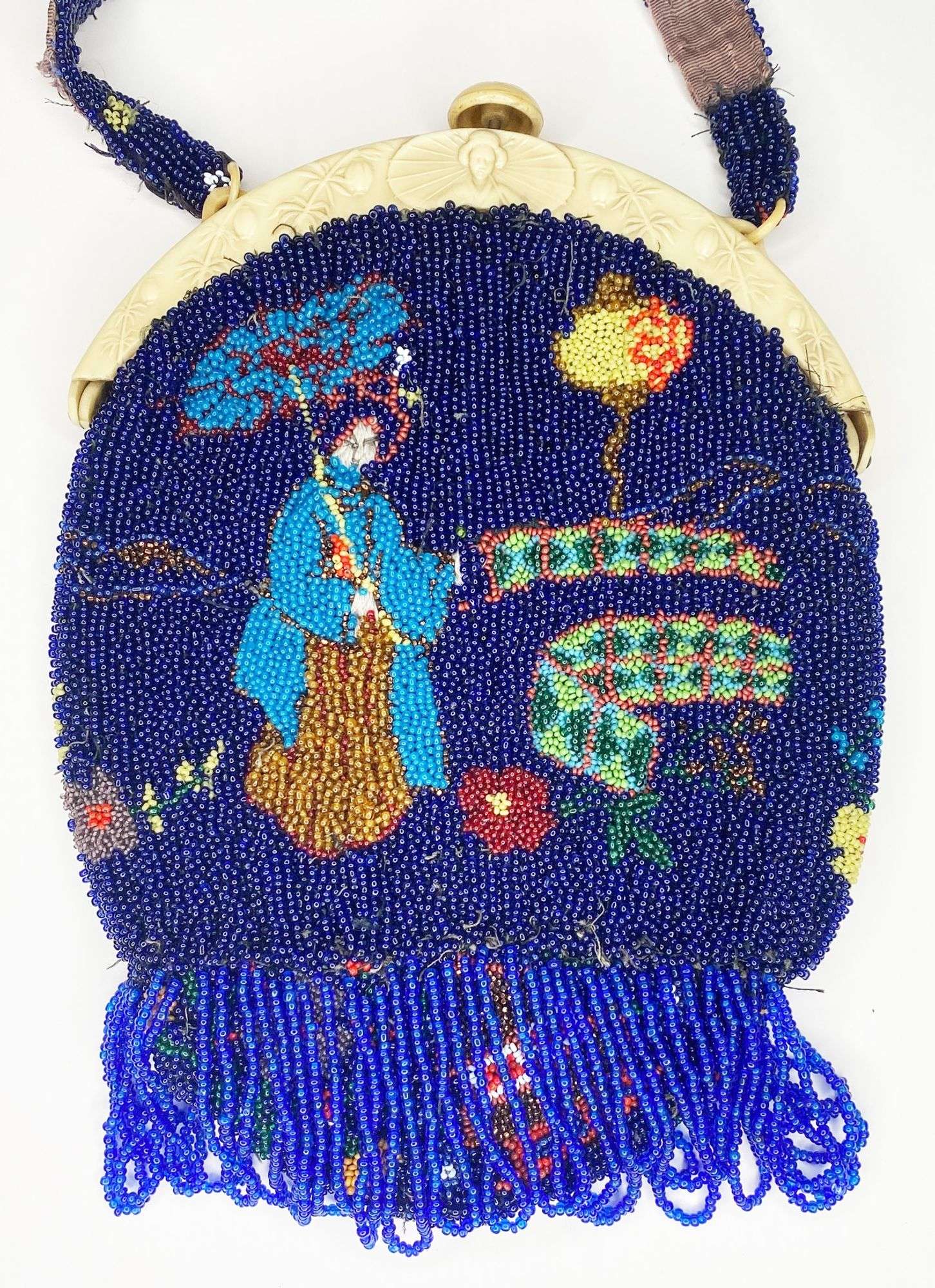 Appraisal: Micro Beaded Geisha Hand Bag with Celluloid Frame long wide