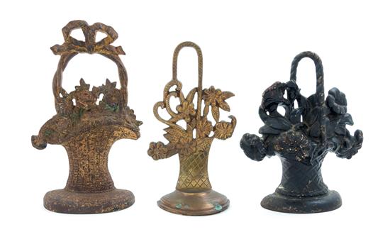 Appraisal: Sale Lot Three Victorian Cast Metal Doorstops each in the