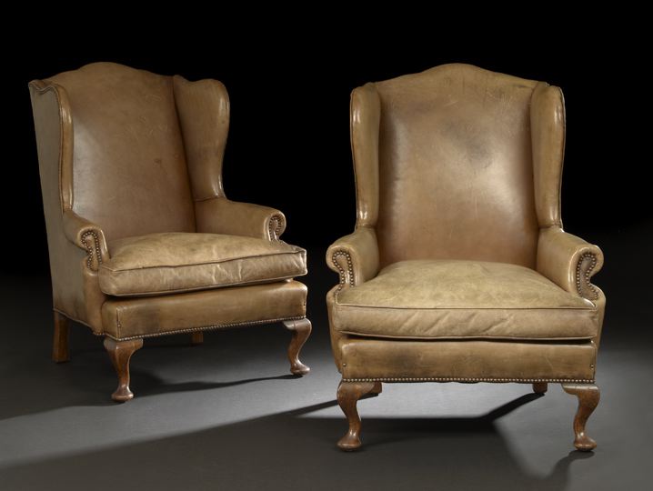 Appraisal: Pair of Queen Anne-Style Oak and Leather-Upholstered Wing Chairs mid-