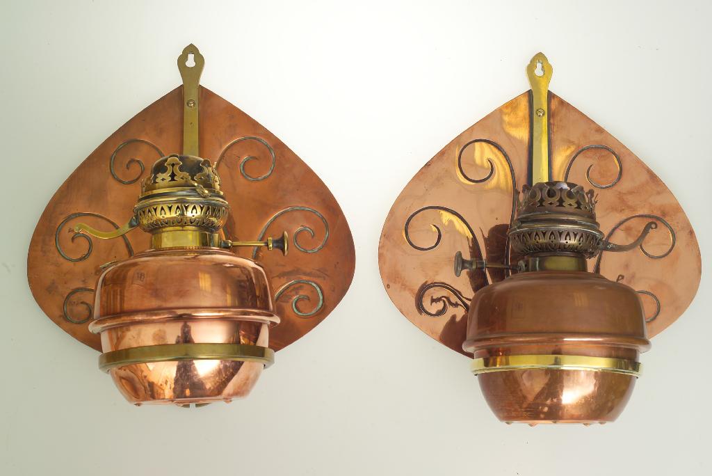 Appraisal: PAIR OF CONTINENTAL COPPER AND BRASS WALL LIGHTS c the