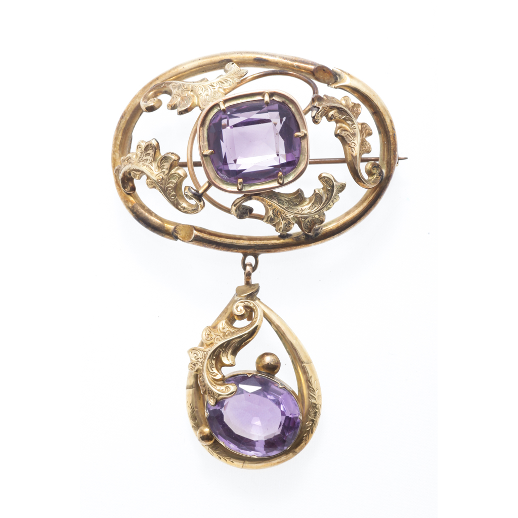 Appraisal: A Victorian amethyst set brooch of pierced oval outline with