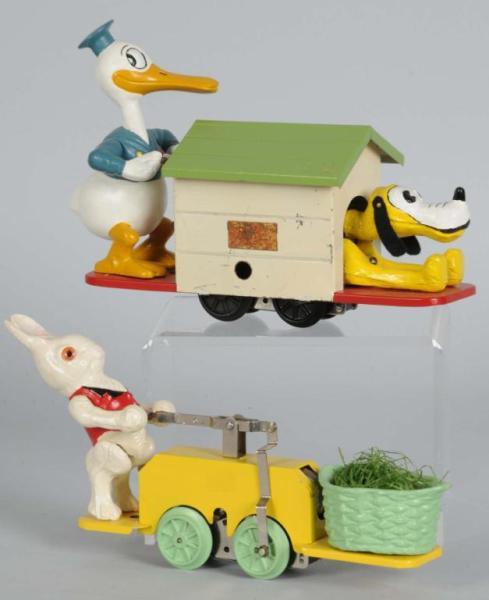 Appraisal: Lot of Character Handcars Description Includes reproduction Peter Rabbit handcar