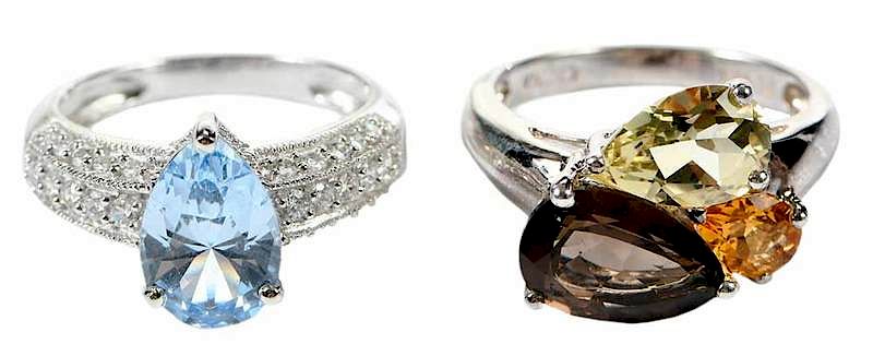 Appraisal: Two Gemstone Rings one with clear and blue imitation stones