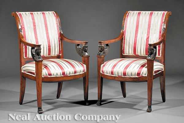 Appraisal: A Pair of French Carved Mahogany and Ebonized Fauteuils th