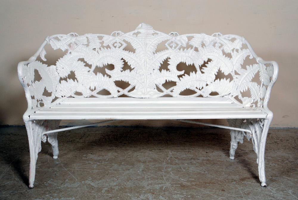 Appraisal: A VICTORIAN CAST IRON GARDEN SEAT in the Fern and