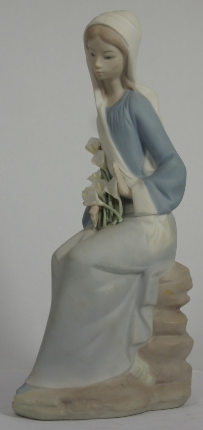 Appraisal: Lladro Figure of a Woman with Lilies chip to finger