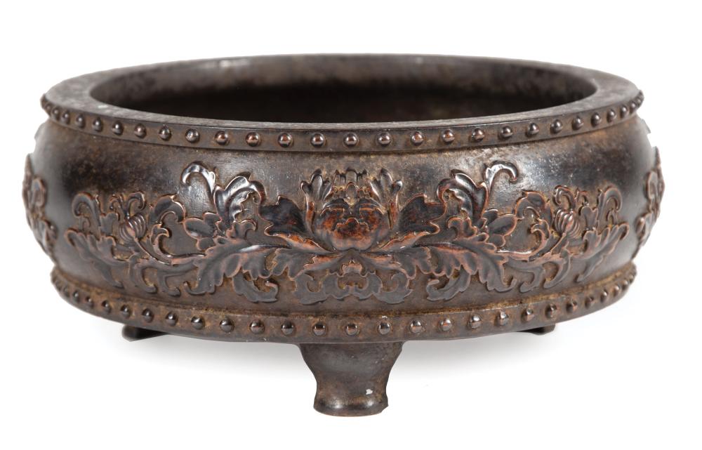 Appraisal: Chinese Bronze Tripod Censer round body relief-decorated with a wide