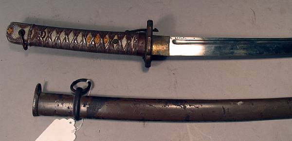 Appraisal: A Japanese non-commissioned officer's shin-gunto Slightly curved inch fullered blade