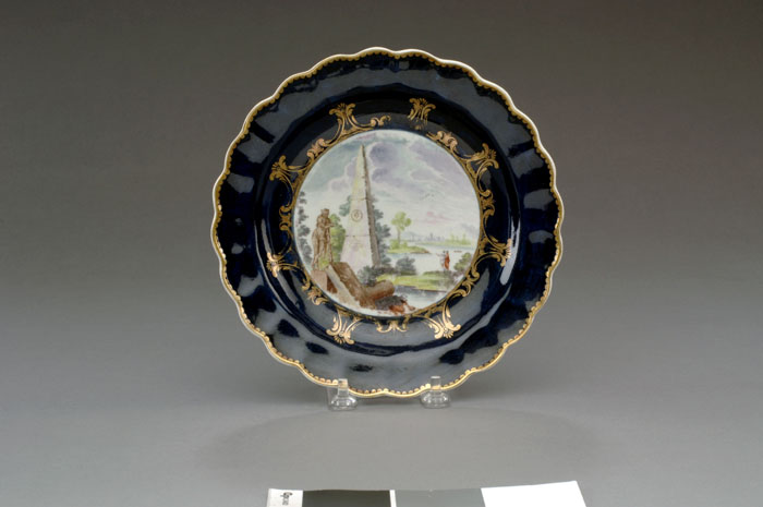 Appraisal: WORCES TER PORCELAIN WET BLUE- GROUND SCENIC DISH CIRCA Painted