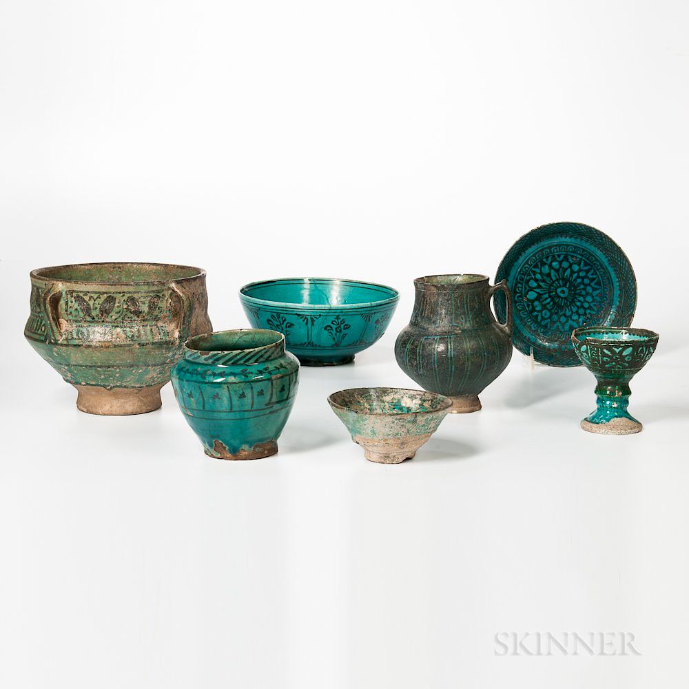 Appraisal: Seven Kashan Turquoise and Black Vessels Seven Kashan Turquoise and