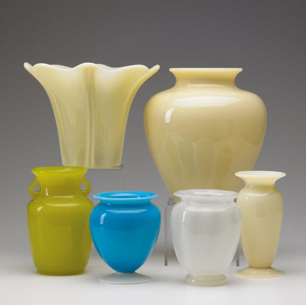 Appraisal: STEUBEN Six glass vases in white ivory yellow and blue