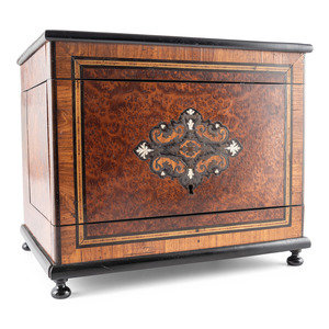 Appraisal: A Burlwood Inlaid Tantalus th Century the interior fitted with