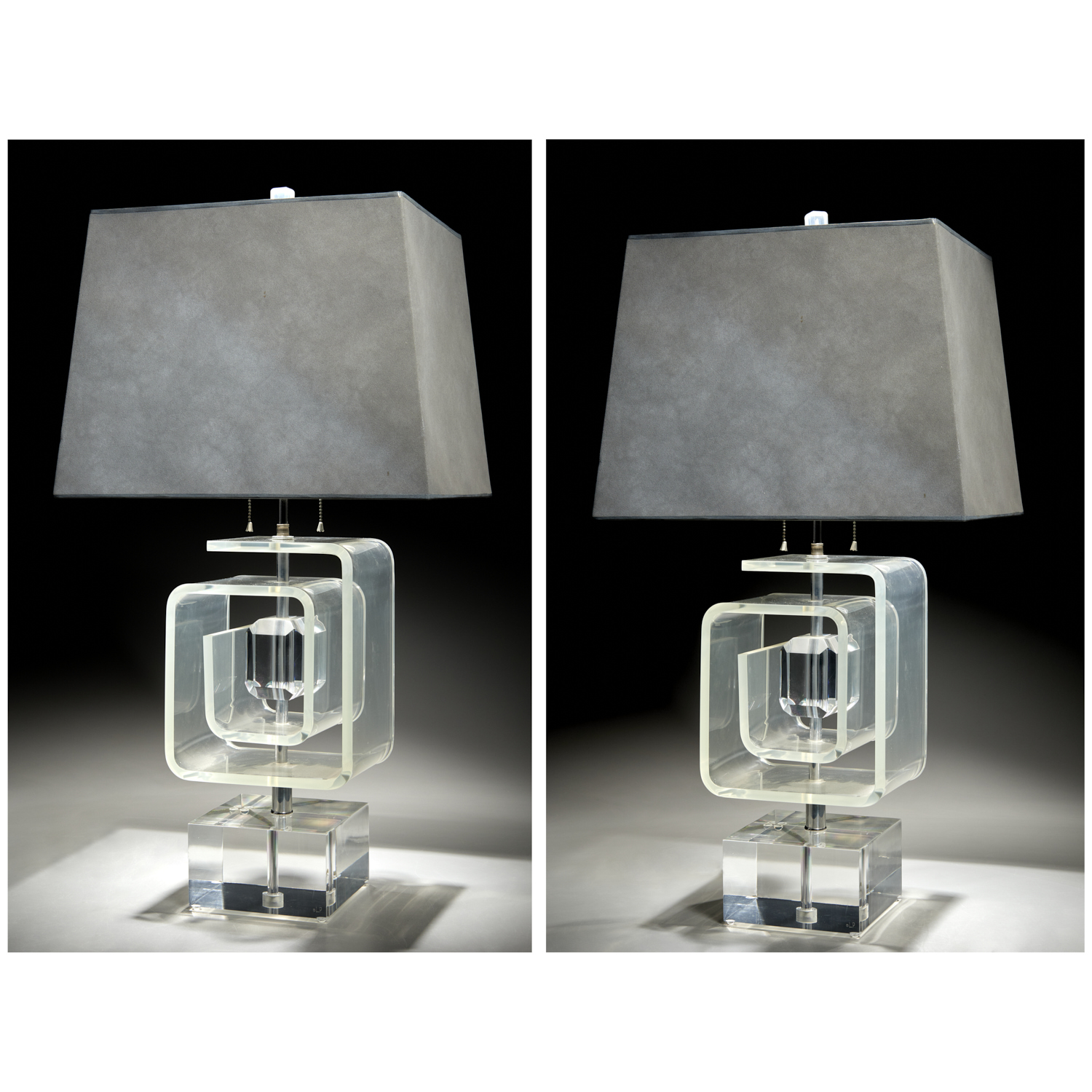 Appraisal: LES PRISMATIQUES PAIR LUCITE TABLE LAMPS th c American chrome