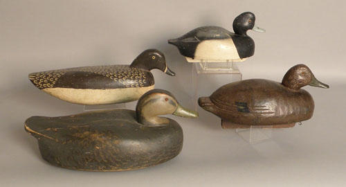 Appraisal: Four duck decoys mid th c oversized black duck hen