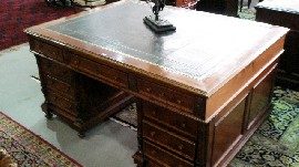 Appraisal: A th Century French walnut twin pedestal partners desk the