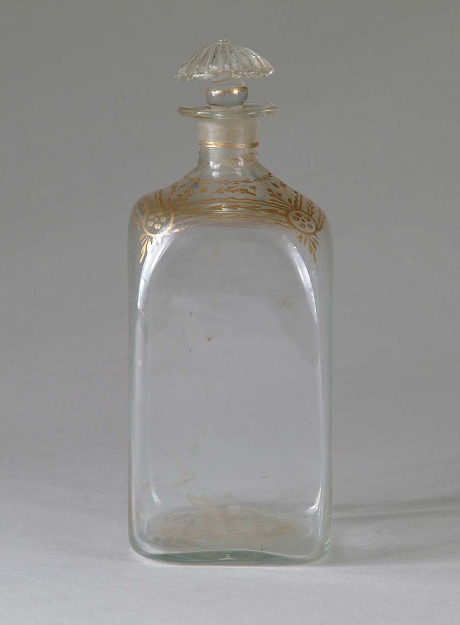 Appraisal: CLEAR BLOWN DECANTER Square decanter with gold enameling and pressed