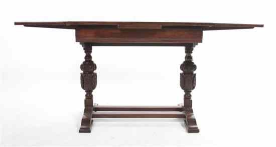 Appraisal: A Renaissance Revival Oak Extension Refectory Table having a rectangular