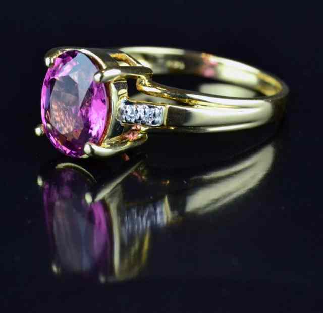 Appraisal: Ladies K Nigerian Rubellite Tourmaline RingCentral oval stone flanked by