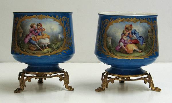 Appraisal: A pair of S vres style porcelain gilt bronze mounted