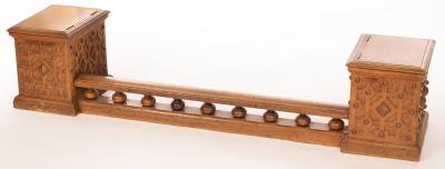 Appraisal: A Victorian oak fender the galleried front rail flanked by