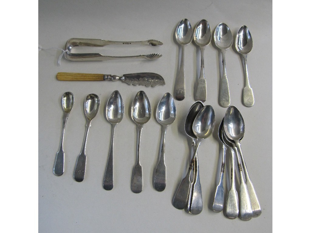 Appraisal: Lot comprising silver tongs butter knife and sixteen assorted silver