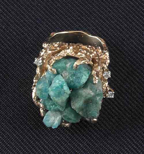 Appraisal: K yellow gold and emerald ring with cluster of unpolished