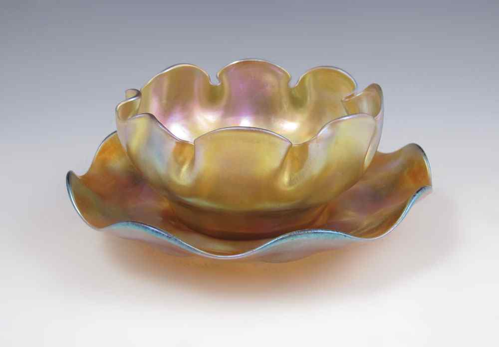 Appraisal: TIFFANY FAVRILE BOWL AND UNDERPLATE Finger bowl and underplate both