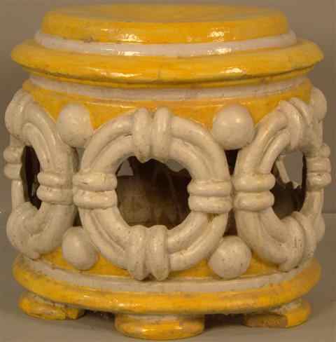 Appraisal: YELLOW AND WHITE GLAZED CERAMIC STOOL of low cylindrical form