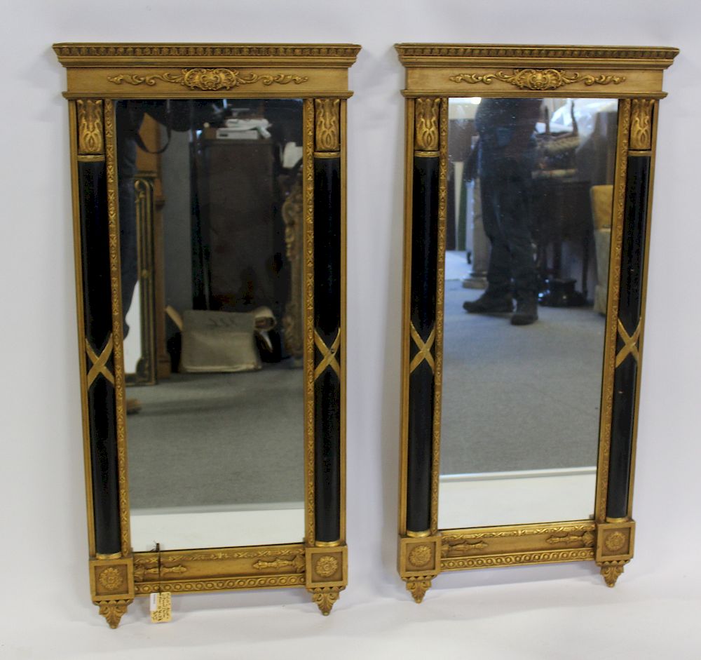 Appraisal: Pair of Vintage Ebonised Gilt Decorated Mirrors From a Larchmont