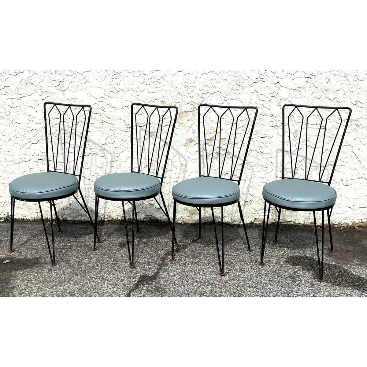 Appraisal: Set Frederick Weinberg Style Chairs Wrought iron patio dining chairs