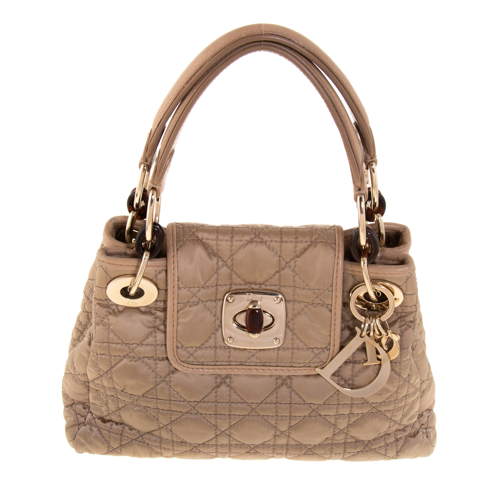 Appraisal: A CHRISTIAN DIOR NYLON CHARMING LOCK BAG A gold nylon