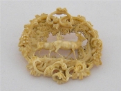 Appraisal: A late th century German Erbach carved ivory brooch finely