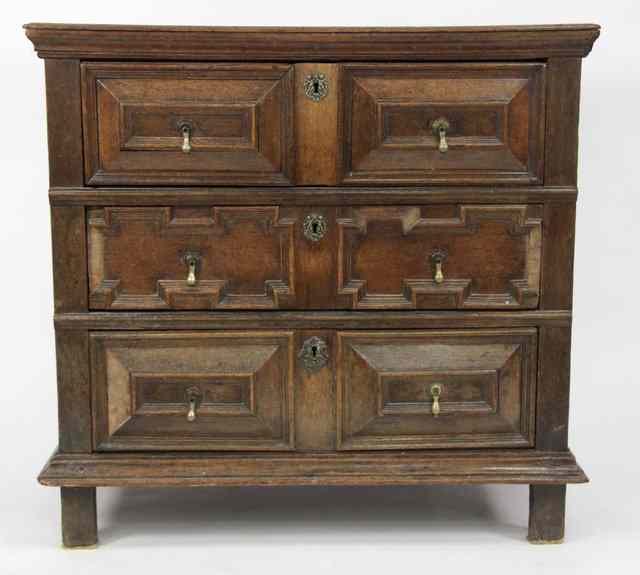 Appraisal: A th Century oak chest fitted three drawers with cushion