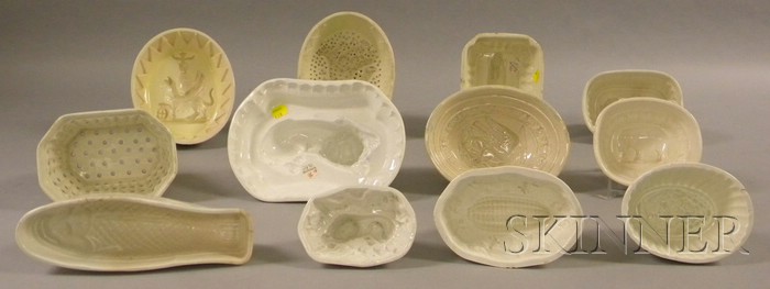 Appraisal: Twelve English Creamware Culinary Molds various shapes subjects include fish