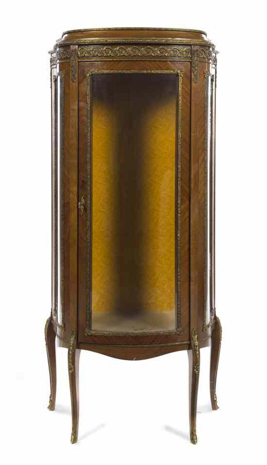 Appraisal: A Louis XV Style Walnut and Gilt Metal Mounted Vitrine