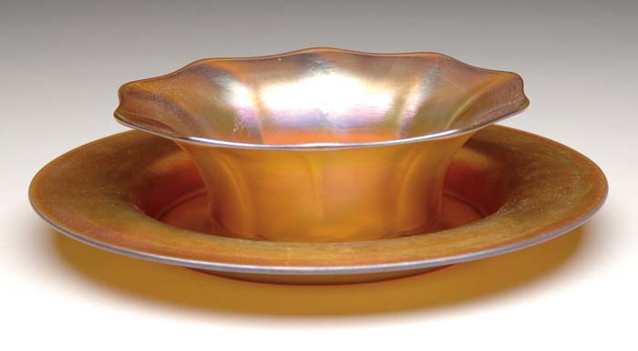 Appraisal: TIFFANY FAVRILE NUT BOWL ART GLASS UNDERPLATE Nicely ribbed gold