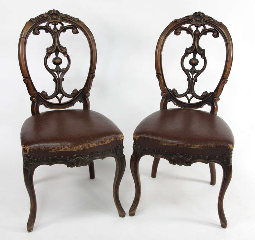 Appraisal: A set of five Victorian walnut dining chairs with pierced