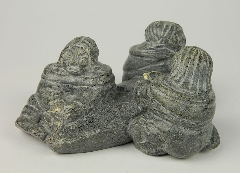 Appraisal: Inuit carved stone sculpture Inuit carved stone sculpture- Three figures