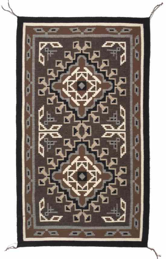 Appraisal: A Navajo Weaving Two Grey Hills geometric design woven on