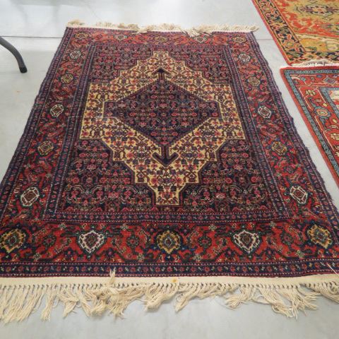 Appraisal: Semi-Antique Persian Handmade Rug elaborate overall stylized florals primarily reds