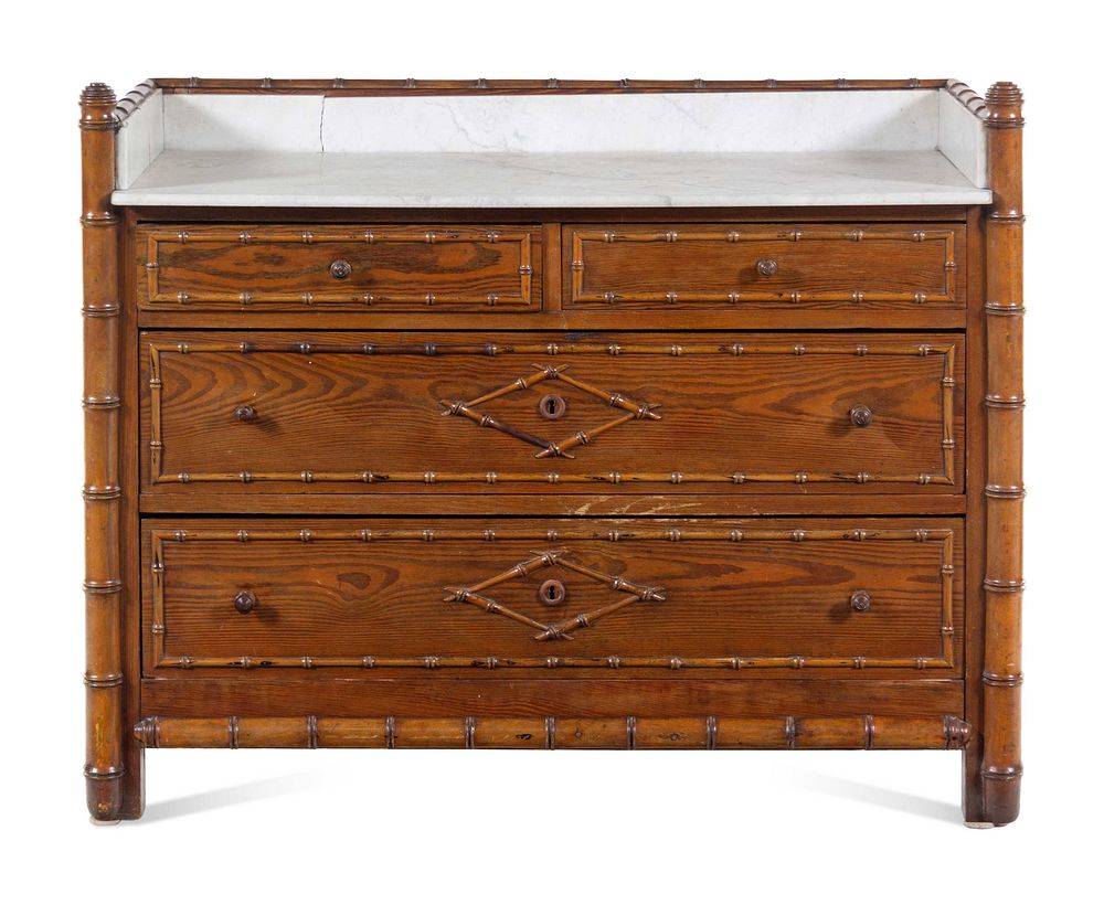 Appraisal: A Victorian Bamboo-Carved Pine Marble-Top Chest of Drawers A Victorian