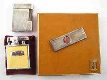 Appraisal: A Dunhill pig skin cigarette case together with a silver